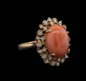 9.15 ctw Coral and Diamond Ring - 14KT Rose Gold: One ring featuring: 14KT rose gold weighing 6.48 grams containing one coral center stone with a total weight of 9.15ct and 30 diamonds with a total weight of 0.70 ct.