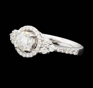 1.31 ctw Diamond Ring - 14KT White Gold: One electronically tested 14KT white gold lady's cast wedding ring with a basket halo with a bright polish finish. The featured lady's ring has a shank measuring 3.00 millimeters wide. Identified