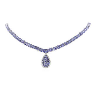 34.55 ctw Tanzanite and Diamond Necklace - 14KT White: One electronically tested 14KT white gold ladies cast & assembled tanzanite and diamond necklace with a bright polish finish. Seventeen and one-half inch length necklace features a tanzanite and