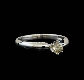 14KT White Gold 0.33 ctw Round Cut Diamond Solitaire: One electronically tested 14KT white gold ladies cast diamond solitaire ring with a half round shank with a bright polish finish. Identified with markings of "14K". Condition is new. Containing: One