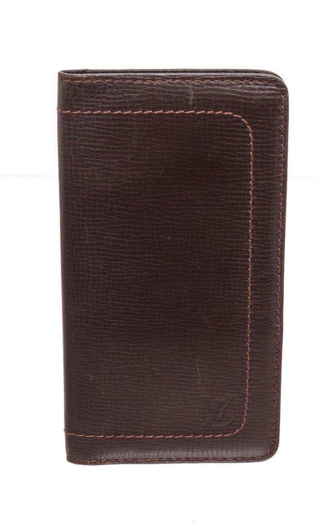 Louis Vuitton Utah Brown Leather Long Card Wallet: Louis Vuitton Utah Brown Leather Long Card Wallet with gold-tone hardware, interior flap pockets, leather lining and bifold closure. CONDITION: Pre-Owned Good overall, please see photographs for detai