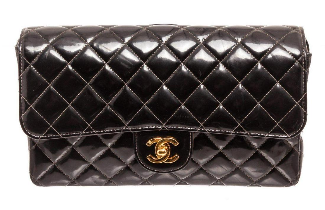 Chanel Black Lambskin Leather Flap Backpack: Chanel Black Lambskin Leather Flap Backpack. Chanel Black Lambskin Leather Flap Backpack with gold-tone hardware, interchangeable chain-link and leather shoulder strap, tonal leather lining, interior 