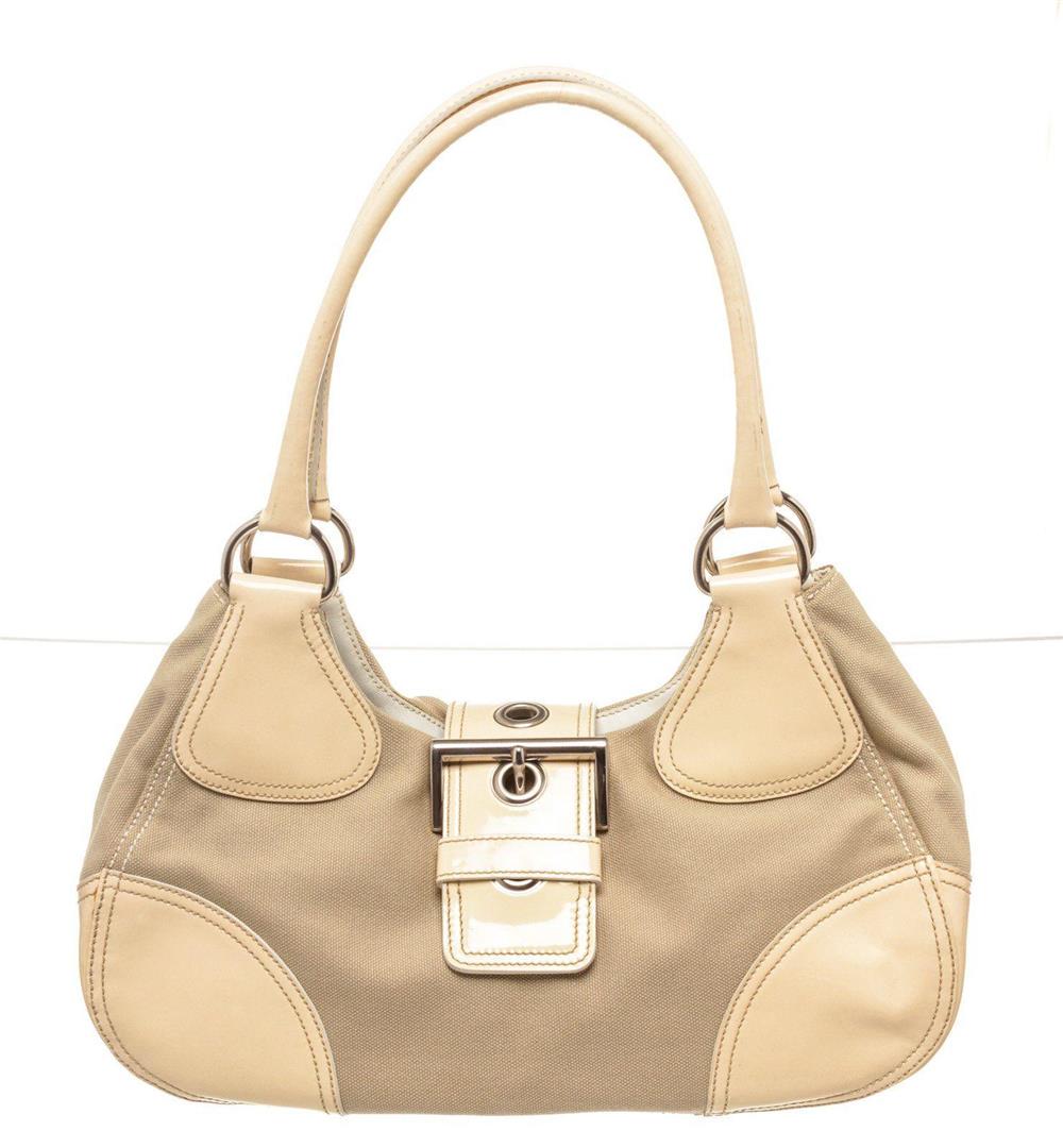 Prada Cream Leather Shoulder Bag: Prada Cream Leather Shoulder Bag. Prada Cream Leather Shoulder Bag with material leather, gold-tone hardware, trim leather, interior zip pocket, dual top handle, shoulder strap and trun lock closure.