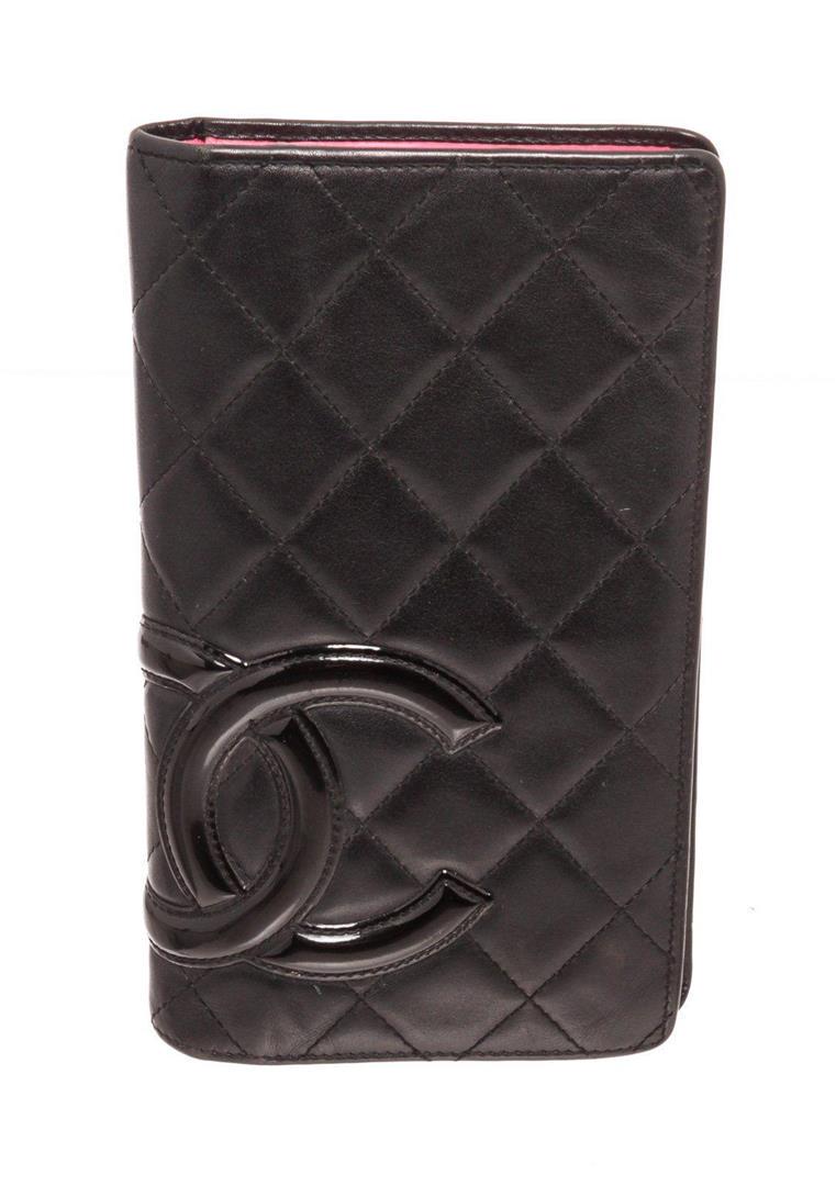 Chanel Black Leather Bifold Long Wallet: Chanel Black Leather Bifold Long Wallet. Chanel Black Leather Bifold Long Wallet with gold-tone hardware, interior three compartments pockets and snap closure. MEASUREMENTS: Length 1 in / 3 cm Width 4