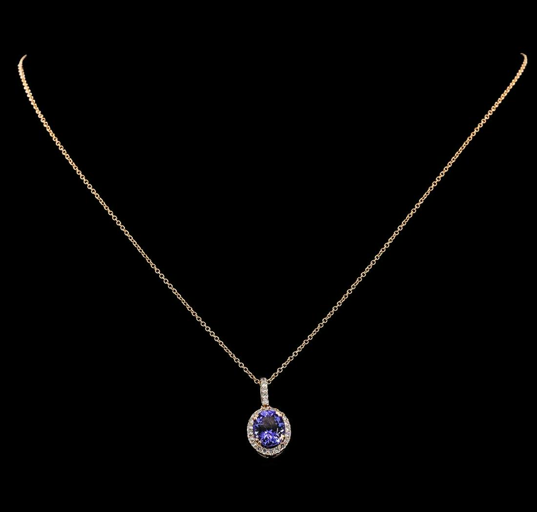 2.46 ctw Tanzanite and Diamond Pendant With Chain -: One Tanzanite and Diamond Pendant with Chain including: 14KT Rose Gold weighing a total of 2.00 grams, Tanzanite weighing a total of 2.46ct, and 26 Diamonds weighing a total of 0.35ctw.