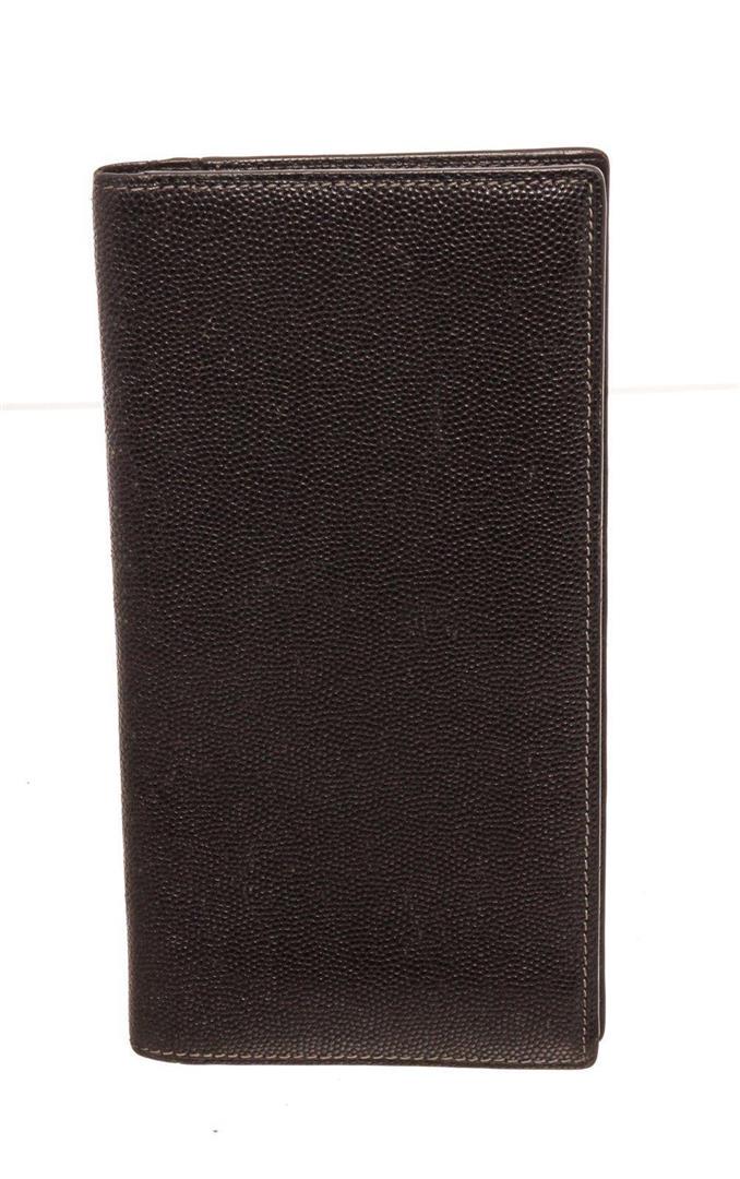 Cartier Black Breast Pocket Wallet: Cartier Black Breast Pocket Wallet. Cartier Black Breast Pocket Wallet with gold-tone hardware, trim leather, interior card holder pocket, leather lining and snap closure. MEASUREMENTS: Length 8 in /
