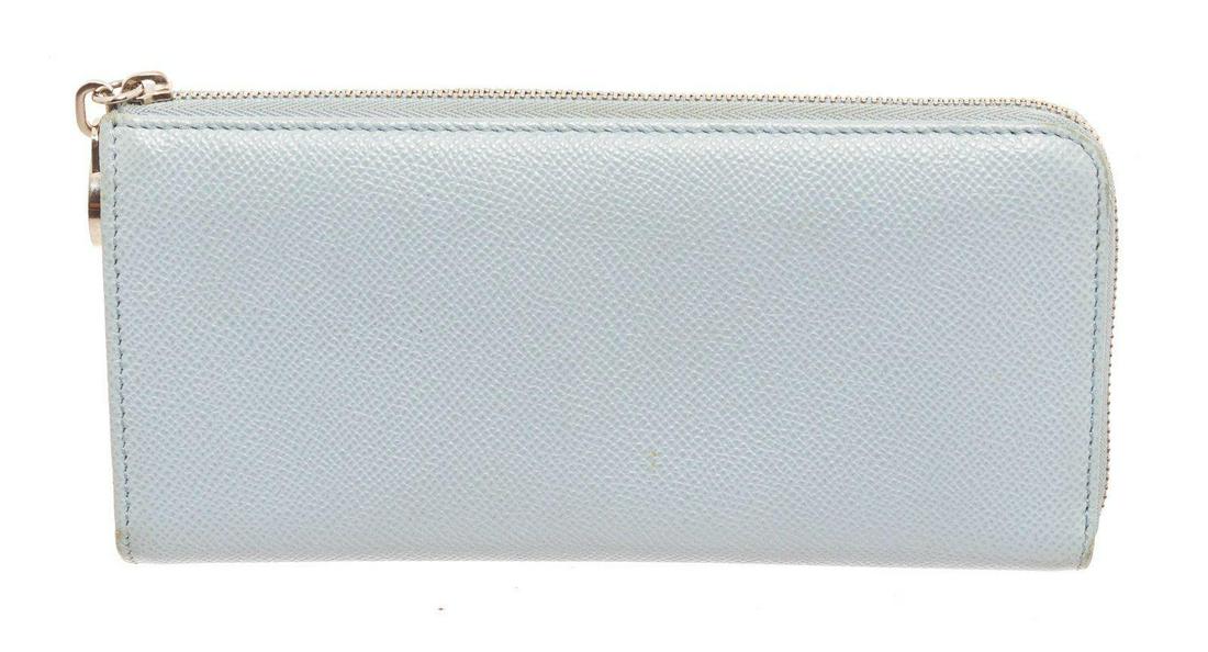 Bvlgari Light Blue Leather Zip Around Wallet: Bvlgari Light Blue Leather Zip Around Wallet. Bvlgari Light Blue Leather Zip Around Wallet with gold-tone hardware, trim leather, interior card holder pocket, leather lining, interior three compartmen