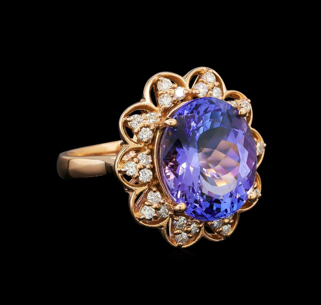 14KT Rose Gold 8.58 ctw Tanzanite and Diamond Ring: One electronically tested 14KT rose gold ladies cast tanzanite and diamond ring with a bright polish finish. Identified with markings of "K14". Condition is new. Containing: One prong set oval modifie