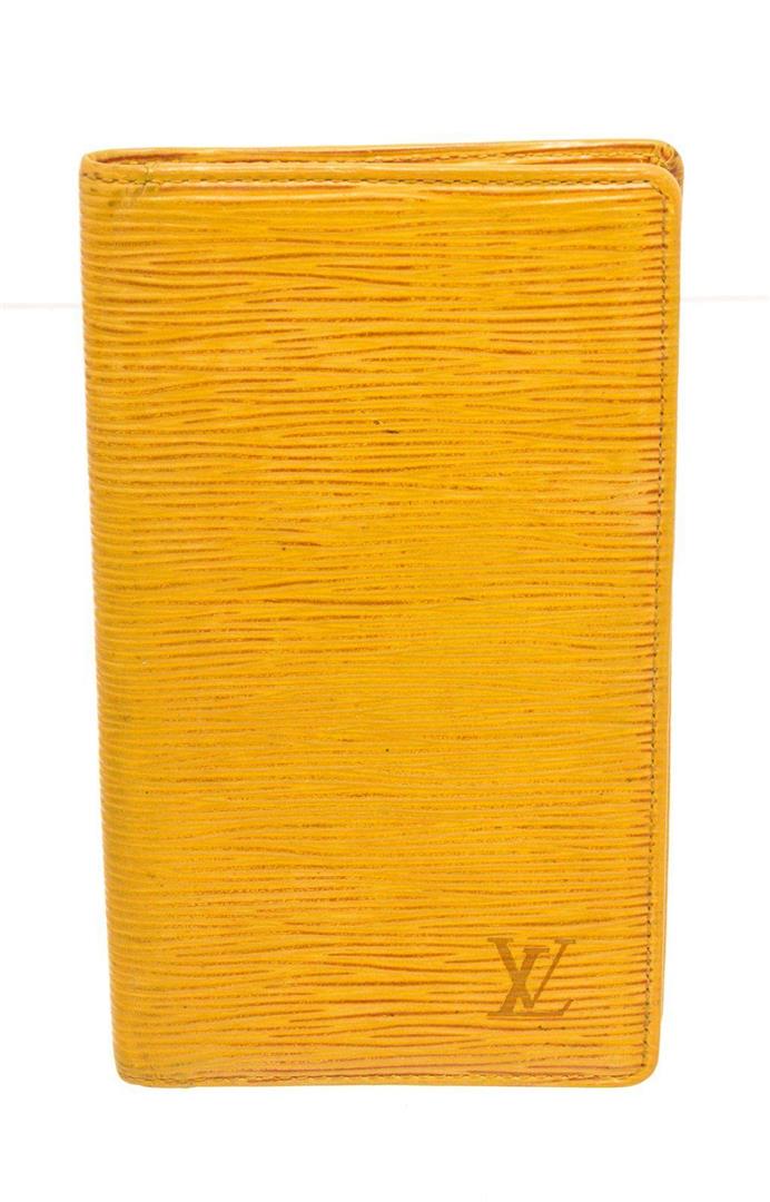 Louis Vuitton Yellow Epi Leather Long Card Wallet: Louis Vuitton Yellow Epi Leather Long Card Wallet. Louis Vuitton Yellow Leather Long Card Wallet with material epi leather, gold-tone hardware, interior card holder pockets, trim tan vachetta leather 