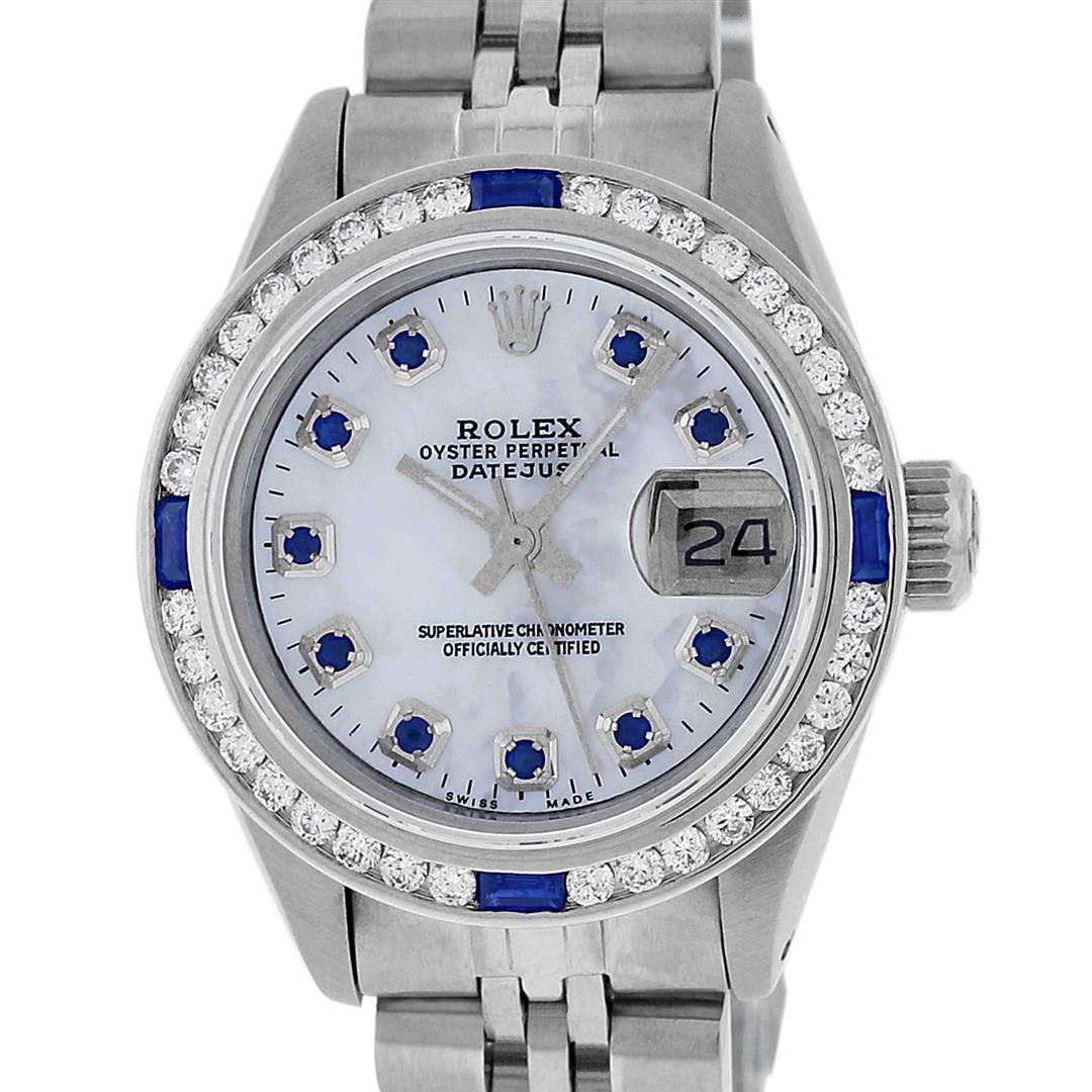 Rolex Ladies Stainless Steel MOP Diamond & Channel Set: One Ladies Stainless Steel Rolex Datejust Polished Bright with Satin Finish, Serviced & Electronically Tested, Stainless Steel Case: 26mm, Stainless Steel Crown, Custom Bezel: New 18K White Gold Sapph