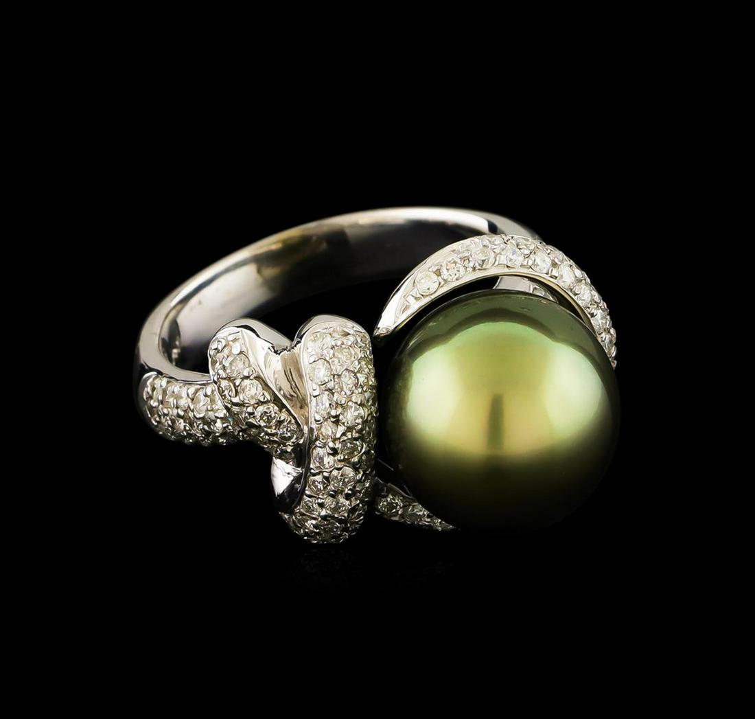 Tahitian Pearl and Diamond Ring - 14KT White Gold: One electronically tested 14KT white gold lady's combination cast & assembled fashion ring with a bypass halo with a bright polish finish. The featured lady's ring has a shank measuring 3.74 millimete
