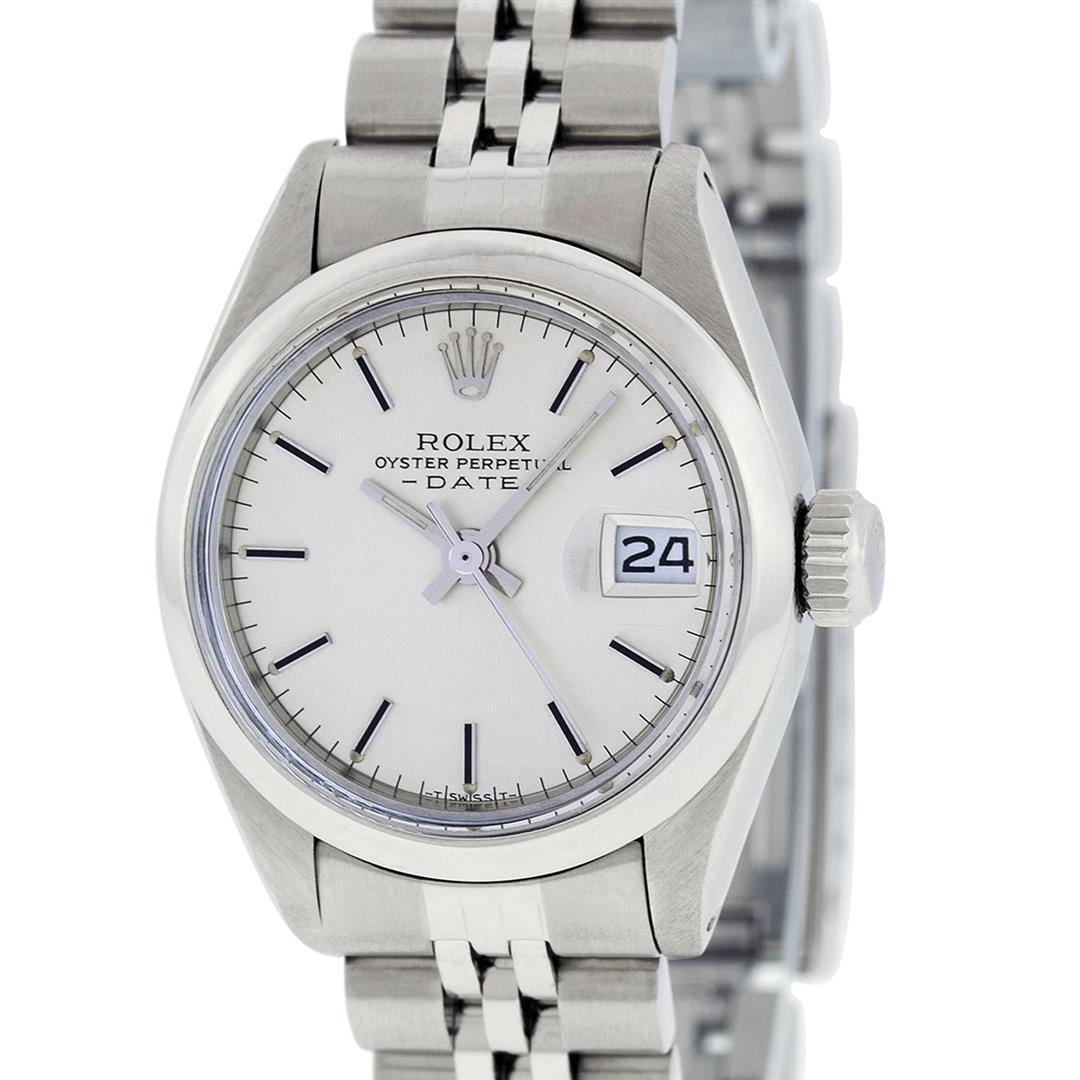 Rolex Ladies Stainless Steel Silver Index 26MM Datejust: One Ladies Stainless Steel Rolex Datejust Polished Bright with Satin Finish, Serviced & Electronically Tested, Stainless Steel Case: 26mm, Stainless Steel Crown, Bezel: Stainless Steel Smooth Bezel. C