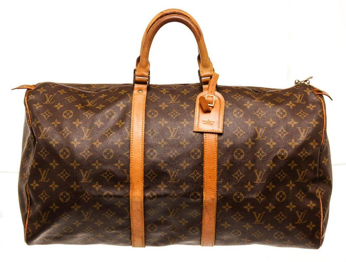Louis Vuitton Brown Keepall 55cm Travel Bag: Louis Vuitton Brown Monogram Keepall 55cm Travel Bag with material monogram canvas, gold-tone hardware, trim tan vachetta leather, dual top handle, shoulder strap and zipper closure.