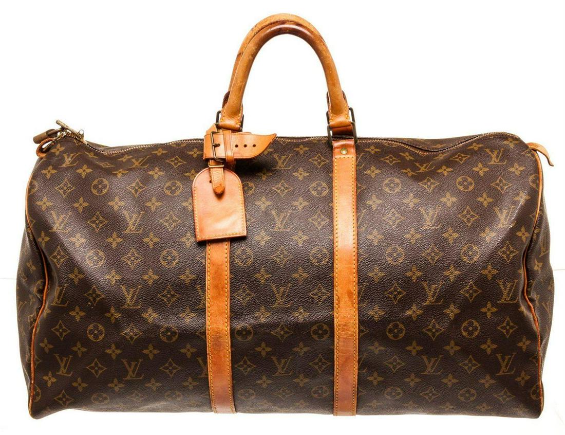 Louis Vuitton Brown Monogram Canvas Keepall 50cm Travel: Louis Vuitton Brown Monogram Canvas Keepall 50cm Travel Bag with monogram canvas, gold-tone hardware, trim tan vachetta leather, dual top handle, adjustable shoulder strap and zipper closure.