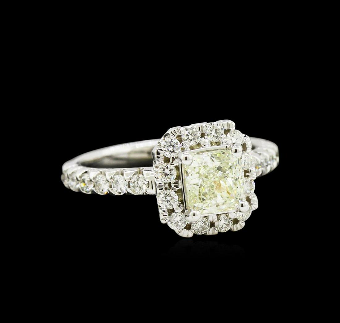 1.64 ctw Diamond Ring - 14KT White Gold: One electronically tested 14KT white gold lady's cast wedding ring with a halo with a bright polish finish. The featured lady's ring has a shank measuring 2.46 millimeters wide. Identified with markin