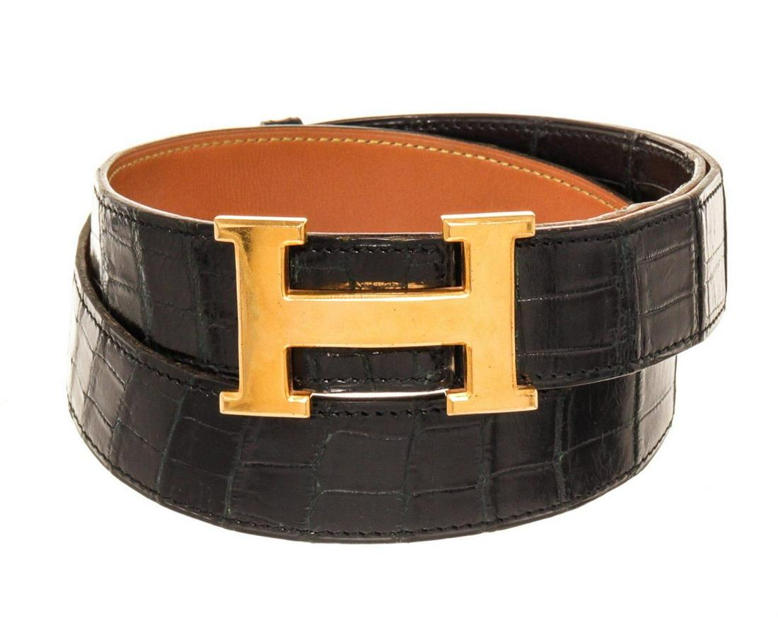Hermes Black Leather Constance Belt: Hermes Black Leather Constance Belt with leather, gold-tone hardware and push lock closure.