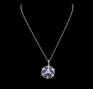 2.88 ctw Tanzanite, Sapphire and Diamond Necklace - 14KT White Gold: One electronically tested 14KT white gold lady's combination cast & assembled fashion pendant and chain 18.0" long, 1.3 mm oval cable link with a lobster claw clasp with a bright polish finish. The