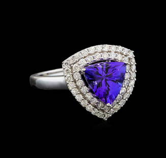 14KT White Gold 1.82 ctw Tanzanite and Diamond Ring: One electronically tested 14KT white gold ladies cast tanzanite and diamond ring with a flat shank with a bright polish finish. Trademark is Orianne. Identified with markings of "14K". Condition is