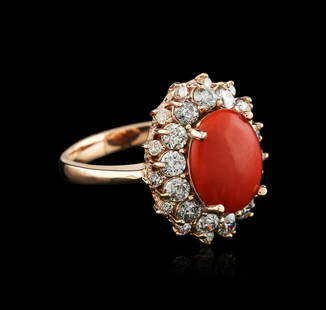 14KT Rose Gold 8.88 ctw Coral and Diamond Ring: One electronically tested 14KT rose gold ladies cast coral and diamond ring with a bright polish finish. Identified with markings of "K14". Condition is new. Containing: Fourteen prong set round