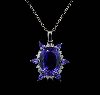 GIA Cert 28.43 ctw Tanzanite and Diamond Pendant With Chain - 14KT White Gold: One electronically tested 14KT white gold lady's combination cast & assembled starburst design pendant & chain 18.0' long, 2mm twisted oval cable link with a lobster claw clasp with a bright polish