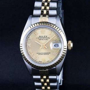 Rolex Ladies 2 Tone Factory Champagne Roman Fluted Datejust Wristwatch: One Ladies Two Tone Rolex Datejust Polished, Serviced & Electronically Tested, Yellow Gold & Stainless Steel Case: 26mm, Yellow Gold Crown, Bezel: Yellow Gold Fluted Bezel. Custom Crystal: New