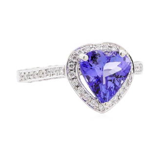 2.61 ctw Tanzanite and Diamond Ring - 14KT White Gold: One electronically tested 14KT white gold lady's cast fashion ring with a basket halo with cathedral shank with a bright polish finish. The featured lady's ring has a shank measuring 1.70 millimeters