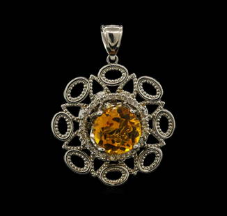 5.56 ctw Citrine and Diamond Pendant - 14KT White Gold: One electronically tested 14KT white gold lady's cast fashion pendant with a bright polish finish. Identified with markings of "14K". Condition is new, good workmanship. Containing: One prong set