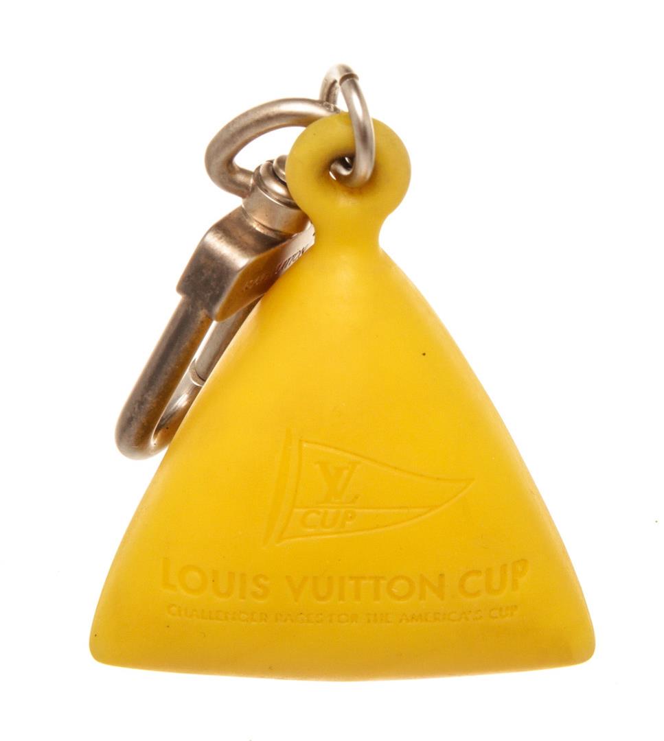 Louis Vuitton Yellow Cup Bouy Key Charm: One Louis Vuitton Yellow Cup Bouy Key Charm. Item is sold AS-IS. All available information is listed in the description and shown in the photo. Louis Vuitton Yellow Cup Bouy Key Charm with gold-tone 