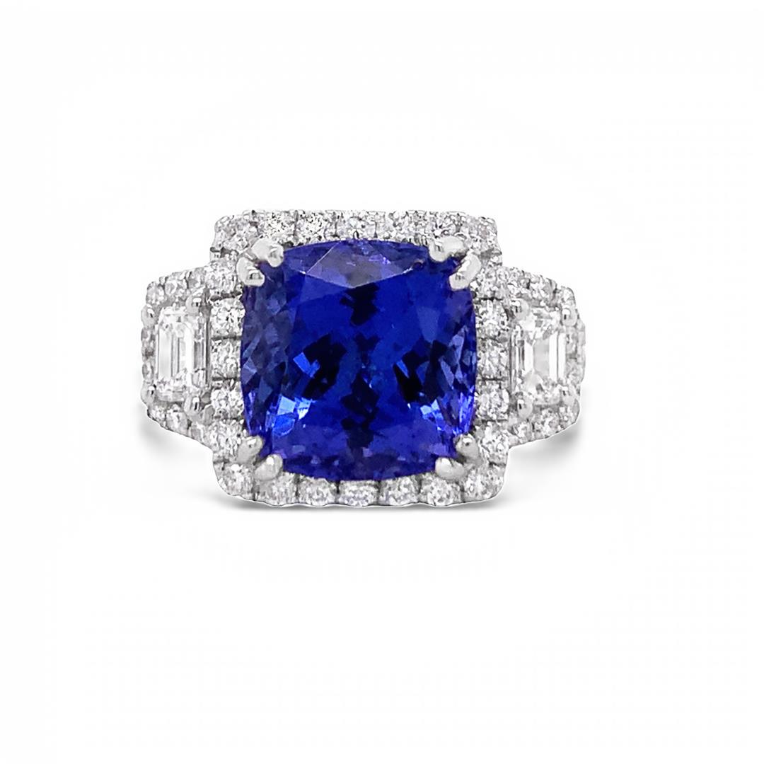 18K Tanzanite Ring 5.56 ct: 18K Tanzanite Ring 5.56ct. Please see Photos and Description for all available information. This stunning ring features a 5.56ct tanzanite center stone set on an 18K white gold band. Tanzanite is the 