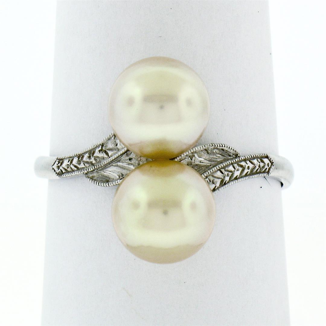 Antique Art Deco Platinum Mikimoto 7.5mm Dual Golden Pearl Engraved Bypass Ring: Antique Art Deco Platinum Mikimoto 7.5mm Dual Golden Pearl Engraved Bypass Ring. Please see photos and description for all available information. An antique art deco solid platinum bypass ring, with 2