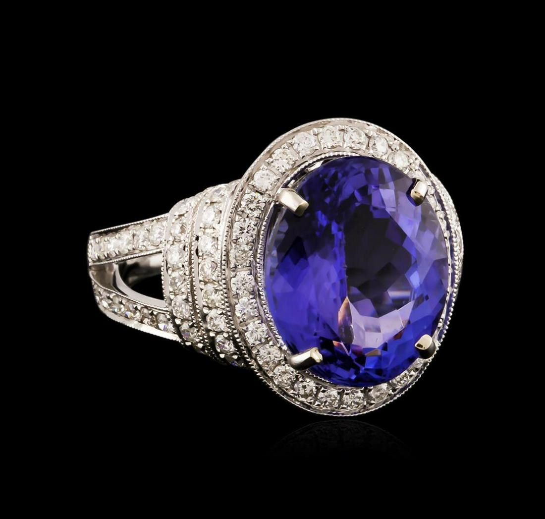 18KT White Gold 7.20 ctw Tanzanite and Diamond Ring: One electronically tested 18KT white gold ladies cast tanzanite and diamond ring with a bright polish finish. Identified with markings of "18K". Condition is new. Containing: One prong set oval modifi