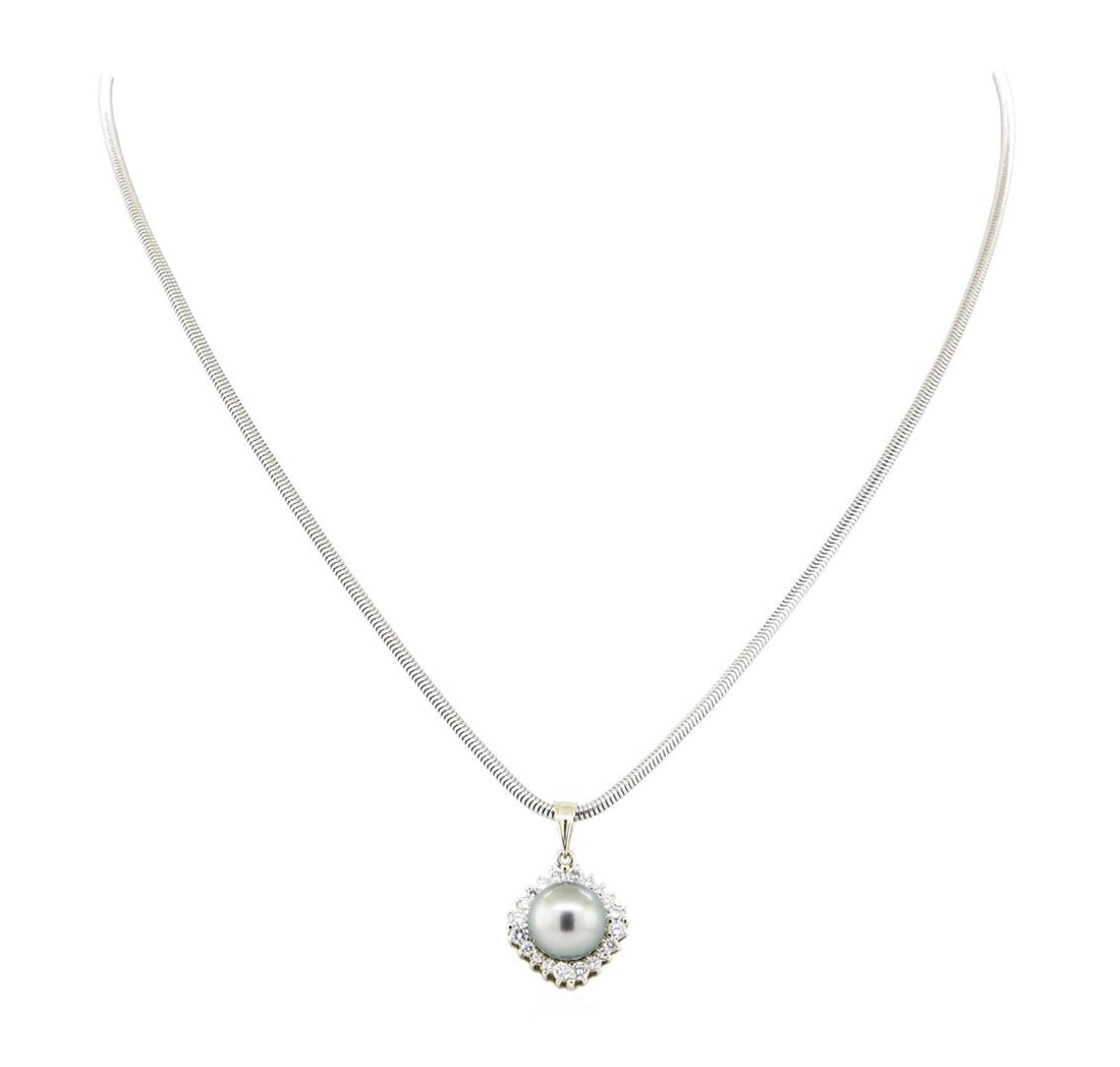 0.64 ctw Diamond and Pearl Pendant & Chain - 14KT White Gold: One electronically tested 14KT white gold lady's combination cast & assembled fashion pendant & chain 18.0' long, 2mm round snake chain with a lobster claw clasp with a bright polish finish. Identifie