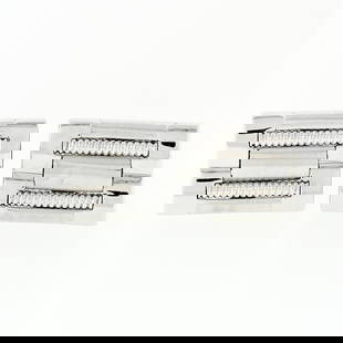 Men's Designer L&M 14k White Gold Fancy Oyster Bracelet Link Swivel Cufflinks: A designer L&M 14k white gold cuuflinks. These cuff links have a swivel design with a clearance of 12.5mm, weigh a total of 14.48 grams, and the front panels measure 15.25x20.97mm.