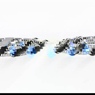 Platinum 43.57 ctw Burma No Heat Cabochon Star Sapphire & Diamond Tennis Bracele: A vintage solid platinum tennis bracelet, featuring 9 oval cabochon cut natural star sapphires (40.50ctw ), with 105 round brilliant cut natural diamonds (F/G - VS1/VS2; 3.07ctw). It weighs a total of
