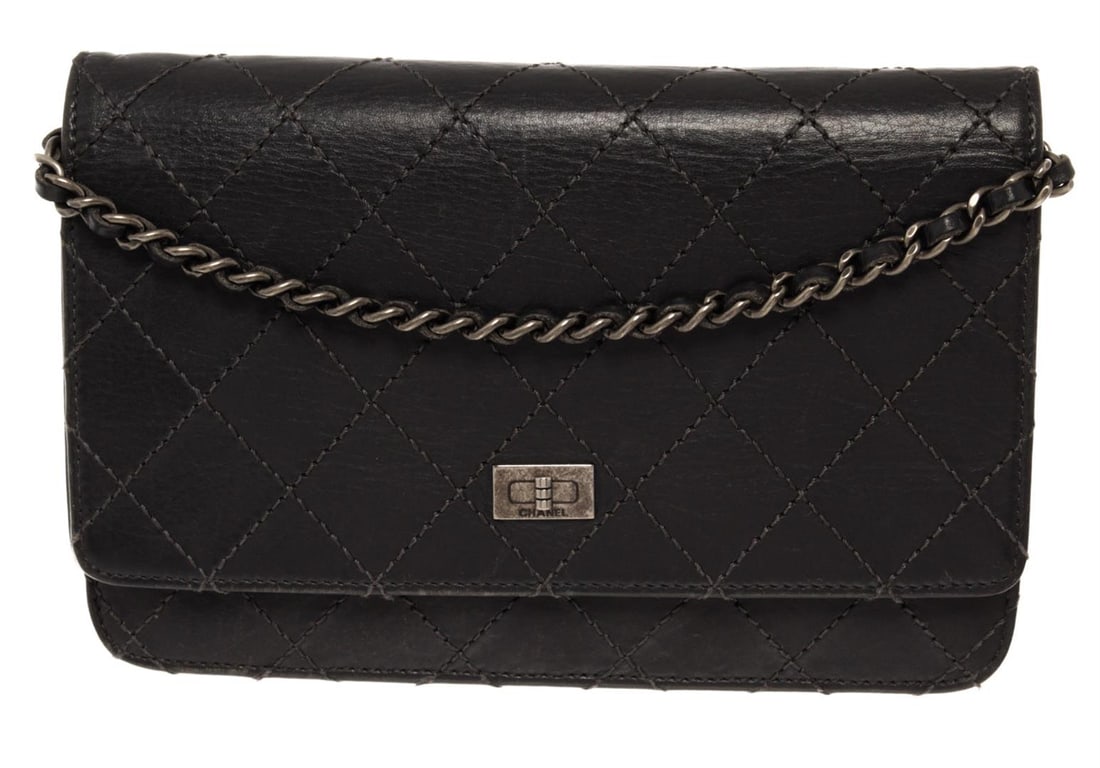 Chanel Reissue WOC Crossbody Black Caviar: Chanel Reissue WOC Crossbody Black Caviar. Brand: Chanel, Style: Reissue WOC, Type: Crossbody, Exterior Color: Black, Exterior Material: Caviar, Exterior Pockets: One, Interior Color: Black, Interior