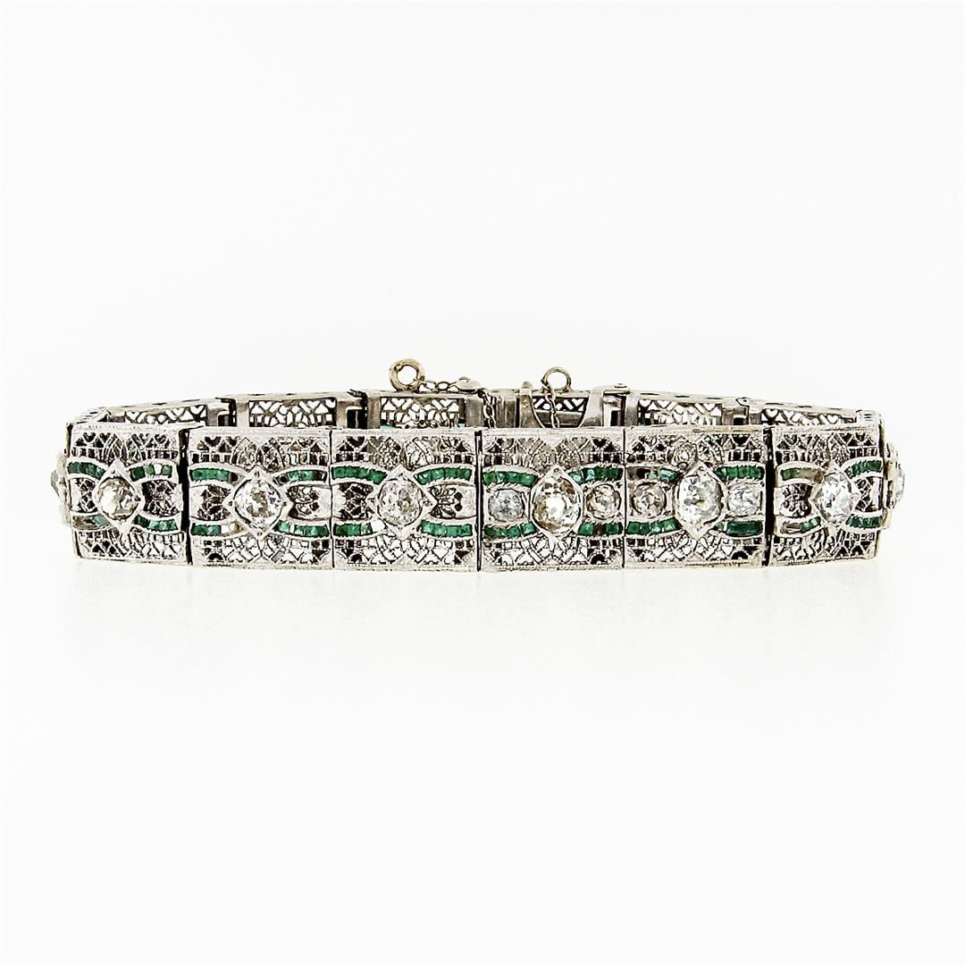 Antique Art Deco 14k White Gold 3.60 ctw Diamond & Emerald Filigree Line Bracele: An antique solid 14k white gold line bracelet. with 18 round and cushion old mine cut natural diamonds (H to L - SI1-I2 ; 3.60ctw), and numerous of square french cut synthetic emeralds. It weighs a to
