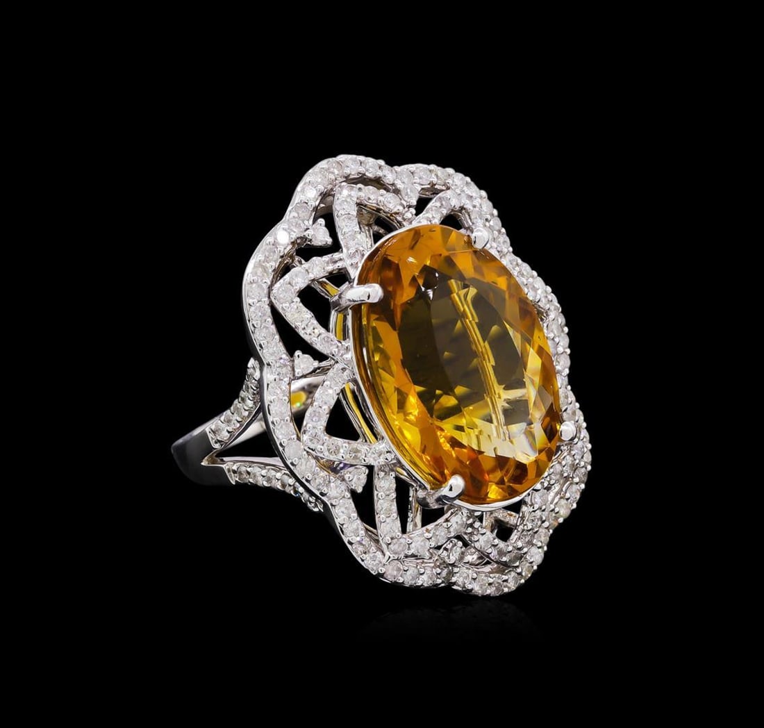14KT White Gold 10.91 ctw Citrine and Diamond Ring: One electronically tested 14KT white gold Ladies combination cast & assembled cocktail ring with a bright polish finish. Identified with markings of "14K". Condition is excellent. Containing: One pron