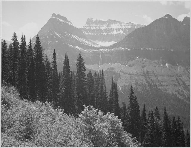 Adams - Glacier National Park Montana 3: Artist: Ansel Adams - Title: Glacier National Park Montana 3 - Medium: Fine Art Reproduction Giclee on Canvas - Image Size: Approximately 15.5 inches x 20 inches - Unframed on Unstretched Canvas - Bio