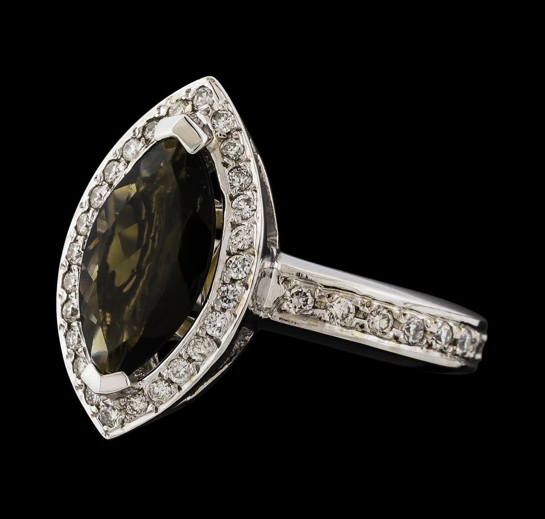 1.61 ctw Tourmaline and Diamond Ring - 14KT White Gold: One ring : 14KT white gold weighing 8.28gm containing tourmaline with a total weight of 1.61ctw and side diamonds weighing 0.52ctw.