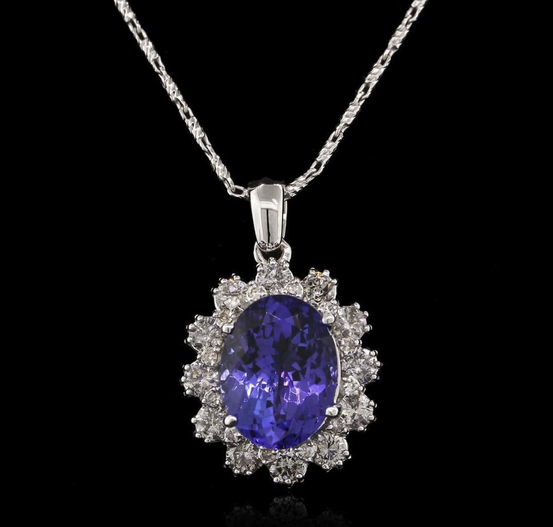 4.80 ctw Tanzanite and Diamond Pendant With Chain - 14KT White Gold: One electronically tested 14KT white gold ladies cast tanzanite and diamond pendant & chain 16.0" long, with a lobster claw clasp with a bright polish finish. Identified with markings of "14K". Condit