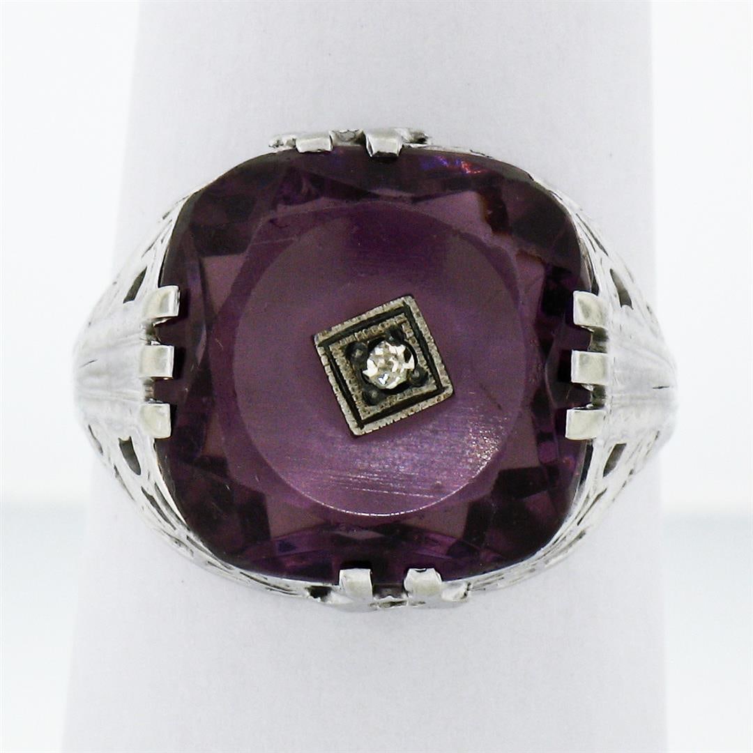 Antique Art Deco 14K White Gold Custom Cut Amethyst Diamond Etched Filigree Ring: An antique solid 14k white gold filigree ring, with 1 custom cut natural amethyst (13.0x13.0mm), and 1 old single cut natural diamond (H - VS2 ; 0.02ct). The ring is size 7.5, weighs a total of 3.77 g
