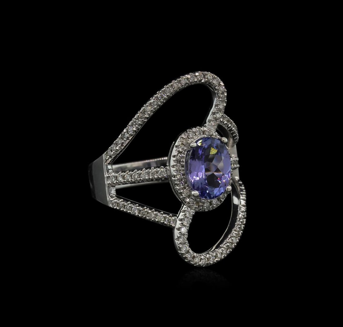 1.50 ctw Tanzanite and Diamond Ring - 14KT White Gold: One ring featuring: 14KT white gold weighing 6.41 grams containing one tanzanite with a total weight of 1.50 ct and 96 diamonds with a total weight of 0.40 ct.