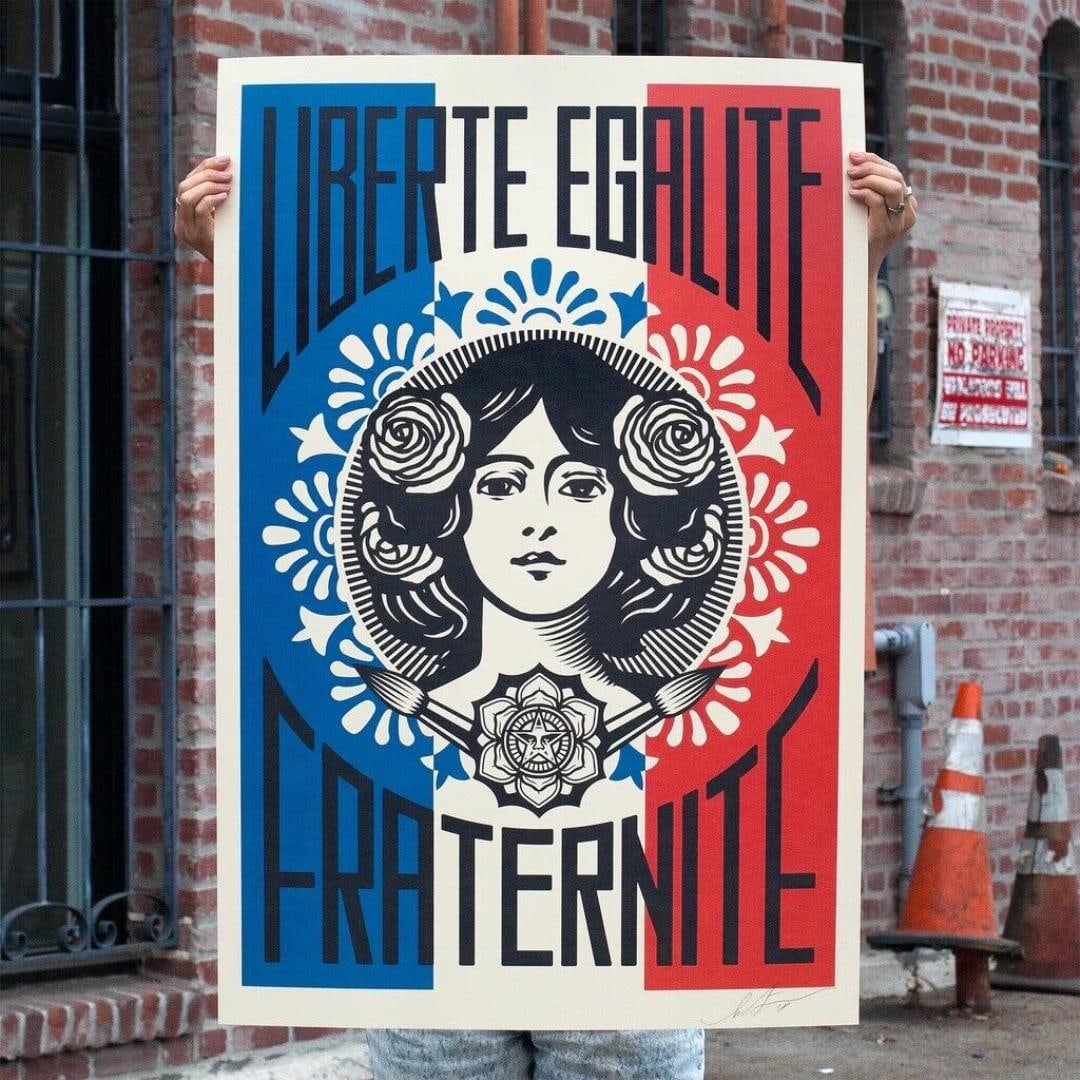 Liberte Egalite by Shepard Fairey: A famous Street Art lithographed poster by Shepard Fairey. One of the artist's signature images, pencil signed with COA sticker. Poster is 36x24 unframed.