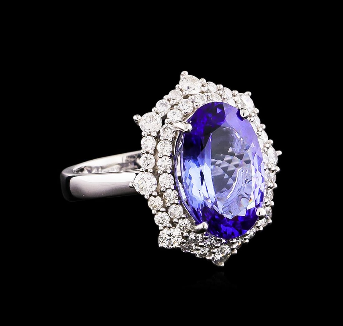 14KT White Gold 5.20 ctw Tanzanite and Diamond Ring: One electronically tested 14KT white gold Ladies combination cast & assembled ring with a bright polish finish. Condition is new. Identified with markings of "14K". Containing: One prong set oval modi