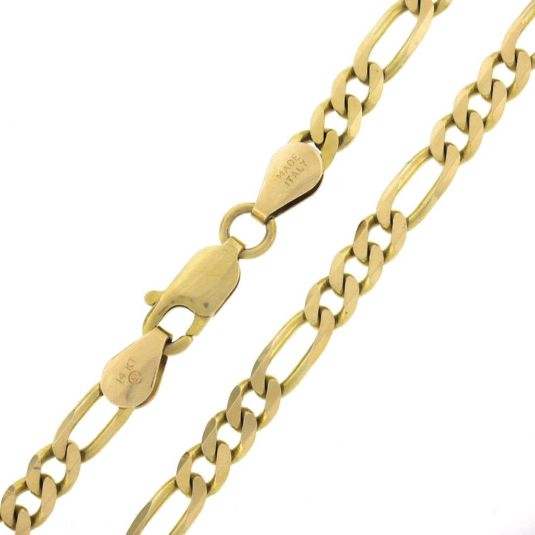 Italian Solid 14K Yellow Gold 16.5" Long 3.6mm Figaro Link Chain Necklace: A solid 14k yellow gold Italian figaro link necklace. It weighs a total of 10.46 grams, measures 3.6mm wide, and measures 16.5 inches in length.