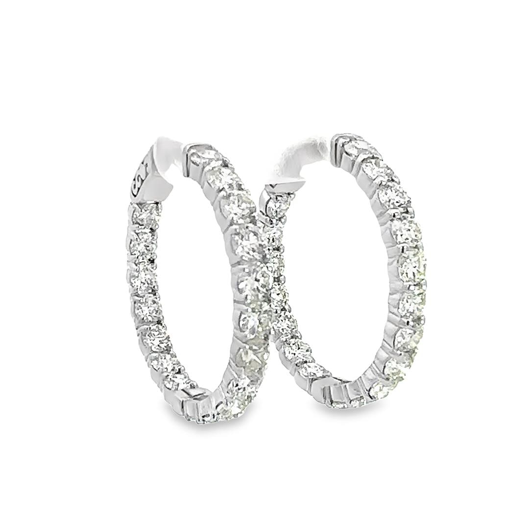 6.41 ctw Diamond Hoop Earrings - 14KT White Gold: One pair electronically tested 14KT white gold lady's combination cast & assembled fashion inside-out hoop earrings with a bright polish finish. The featured hoop earring has a diameter of 30 millimet