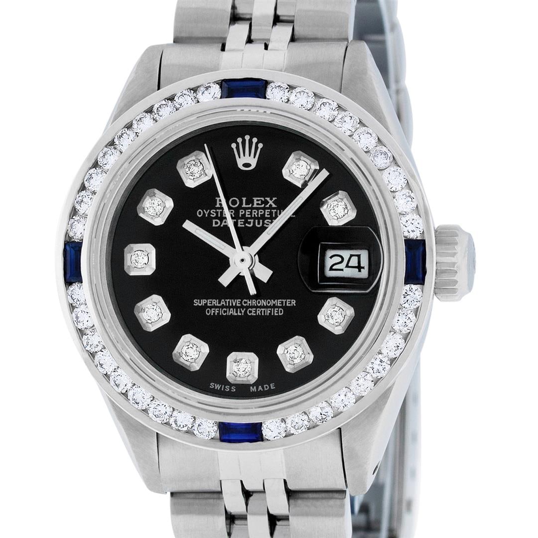 Rolex Ladies Stainless Steel Black Diamond And Channel Set Sapphire Wristwatch: One Ladies Rolex Stainless Pre Owned Steel Wristwatch Polished Bright with Satin Finish, Serviced & Electronically Tested, Stainless Steel Case: 26mm, Stainless Steel Crown, Custom Bezel: New 18K Whit