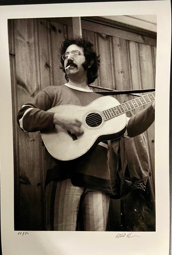 Jerry with Pall Mall by Elliot Blinder: A hand-signed & numbered glossy photograph shot in 1969 for Rolling Stone by photographer/author Elliot Blinder . Image is 14.75x10"on 18x22" paper .#14/50. Shot backstage at The Boston tea Party club