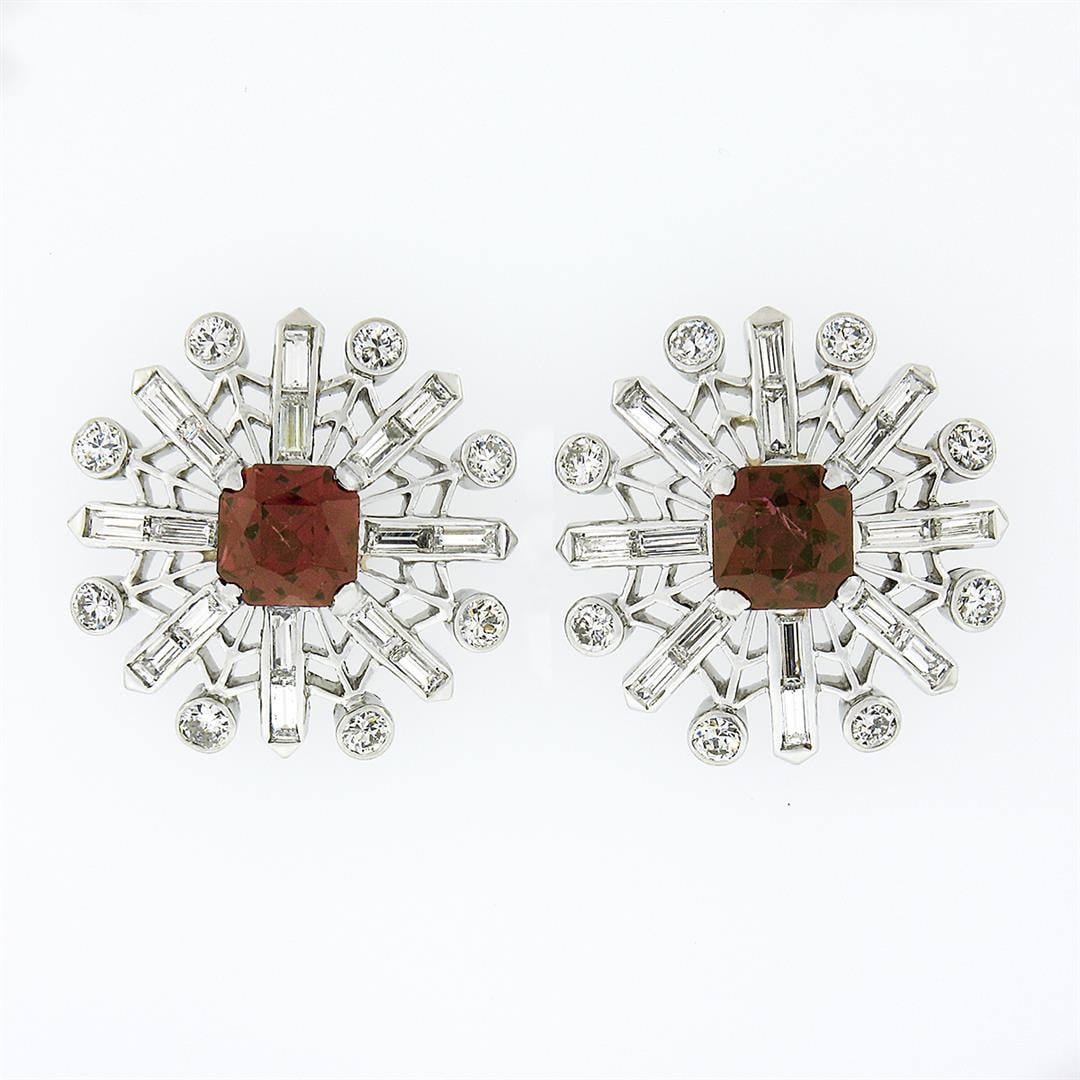 Vintage Platinum 4.02 ctw Rhodolite Garnet & Diamond Snowflake Post Stud Earring: A vintage solid platinum pair of stud earrings, with 2 radiant cut natural garnets (2.0ctw), surrounded with 16 old transitional & 32 straight baguette cut natural diamonds (G/H - VS1/VS2 ; 2.02ctw).