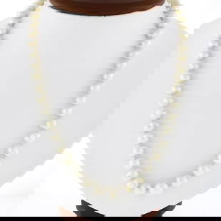 Vintage 18" 9.5mm Graduated Pearl Strand Necklace with 14k Gold Filigree Clasp: A vintage strand necklace with 14k white gold clasp, featuring 53 round shape cultured pearls (9.5mm to 7mm each), and 3 round shape cultured pearls on clasp (4.25mm to 4.7mm each). It weighs a total